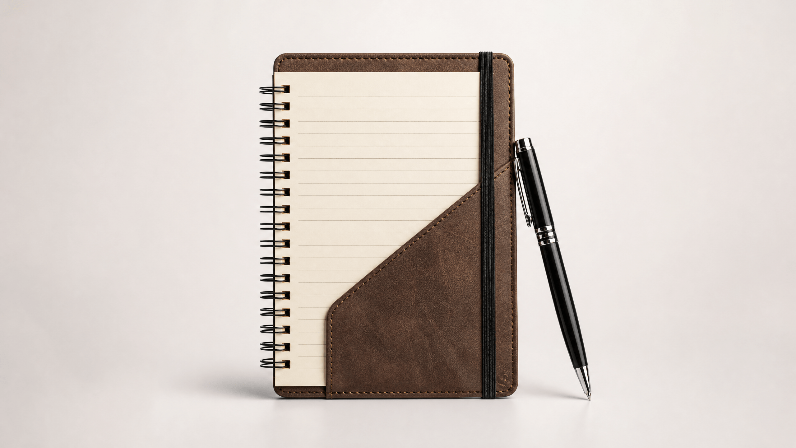 A reporter's notebook and pen, symbolizing the process of monitoring incremental updates.