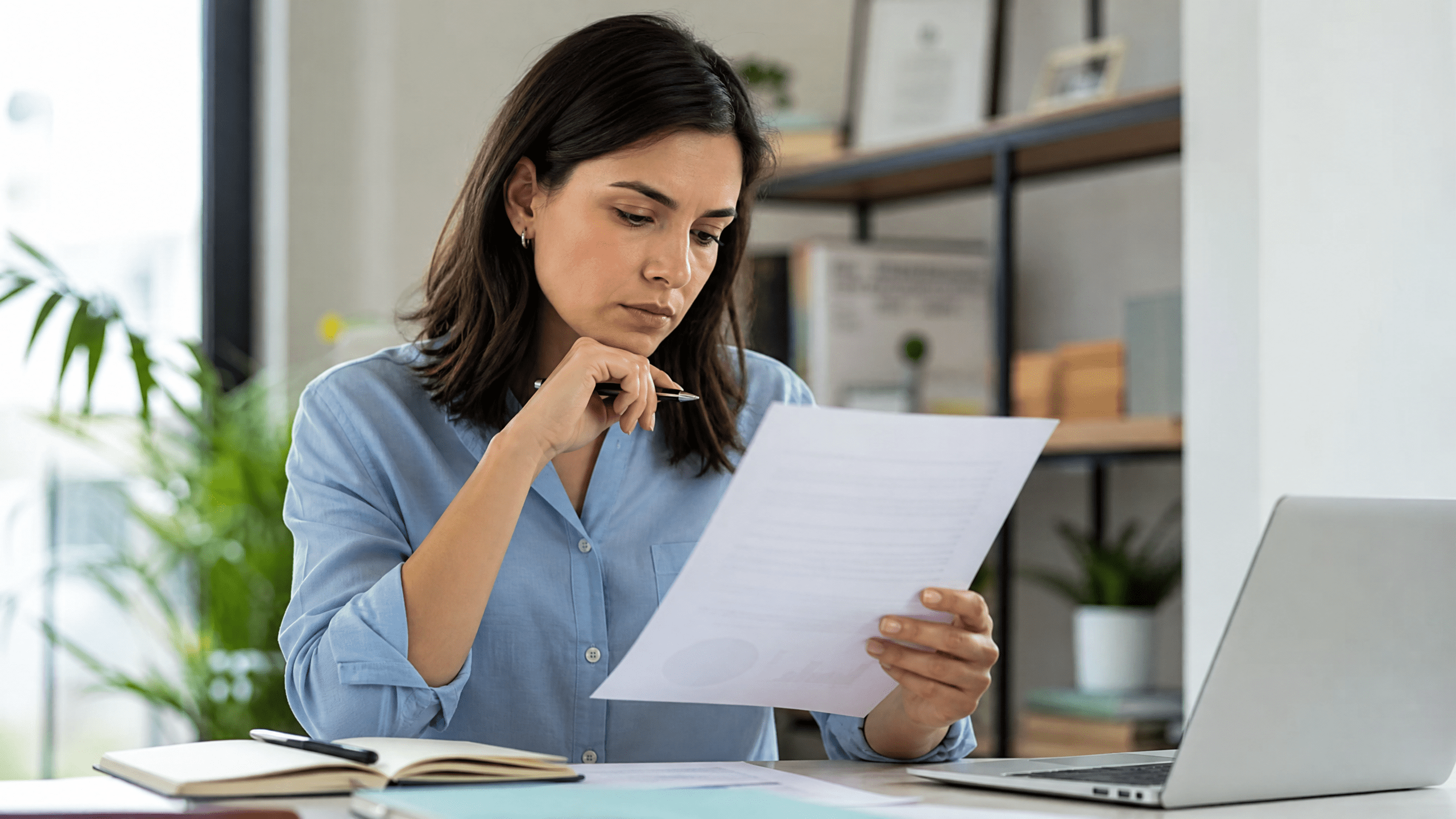 Scanning opinion headers carefully A person reading a document carefully, illustrating the importance of avoiding common pitfalls when scanning a header.